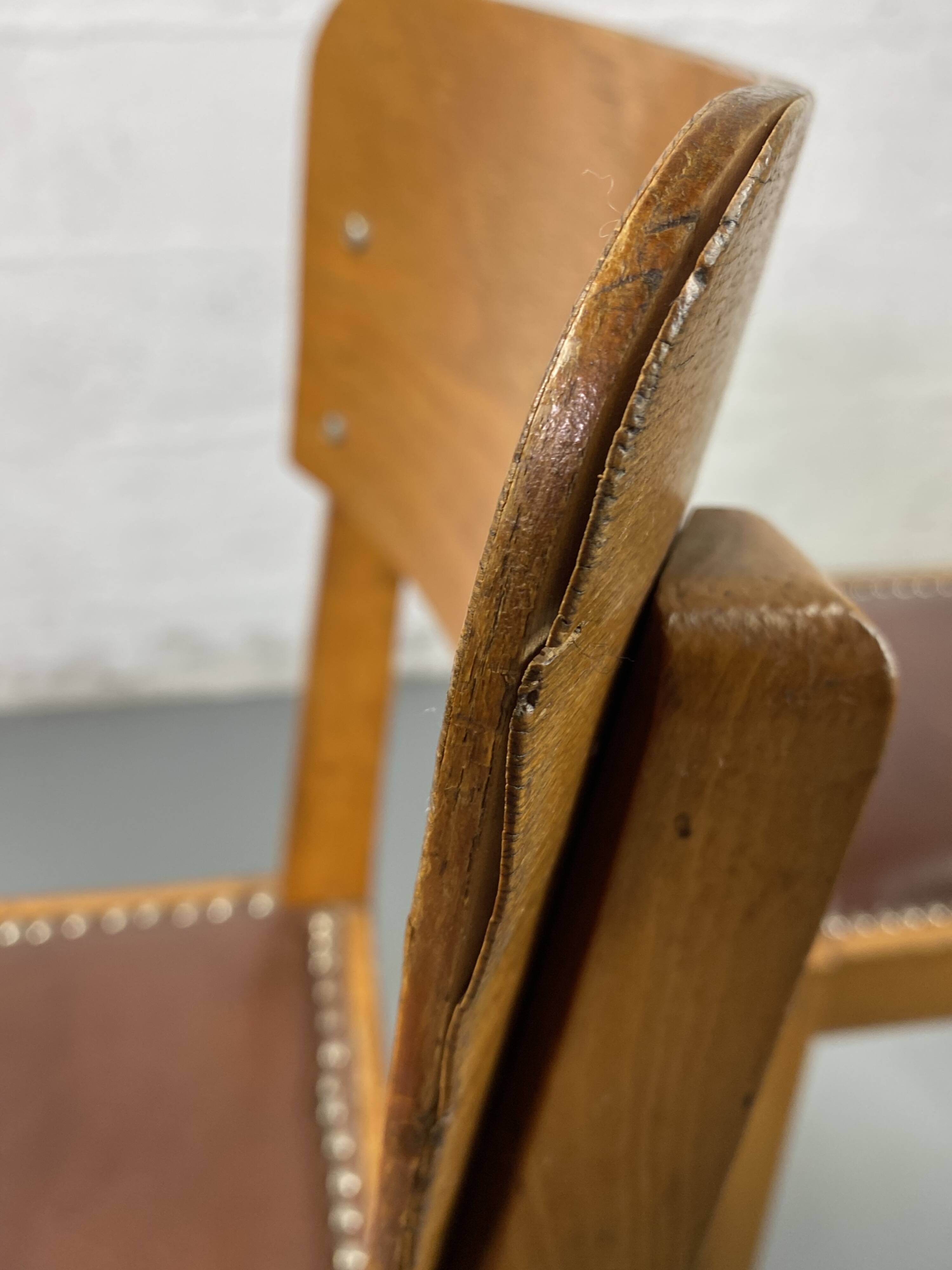 Pair of wooden and leather chairs