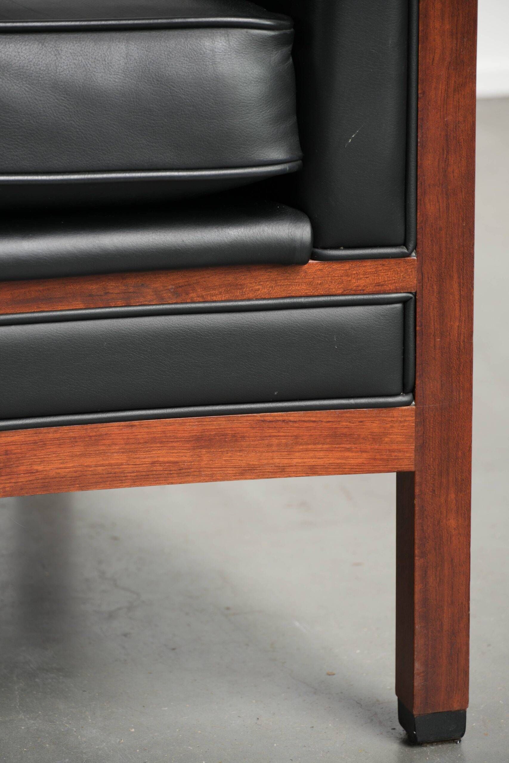 Set of 2 Art Deco design armchairs in black cowhide leather