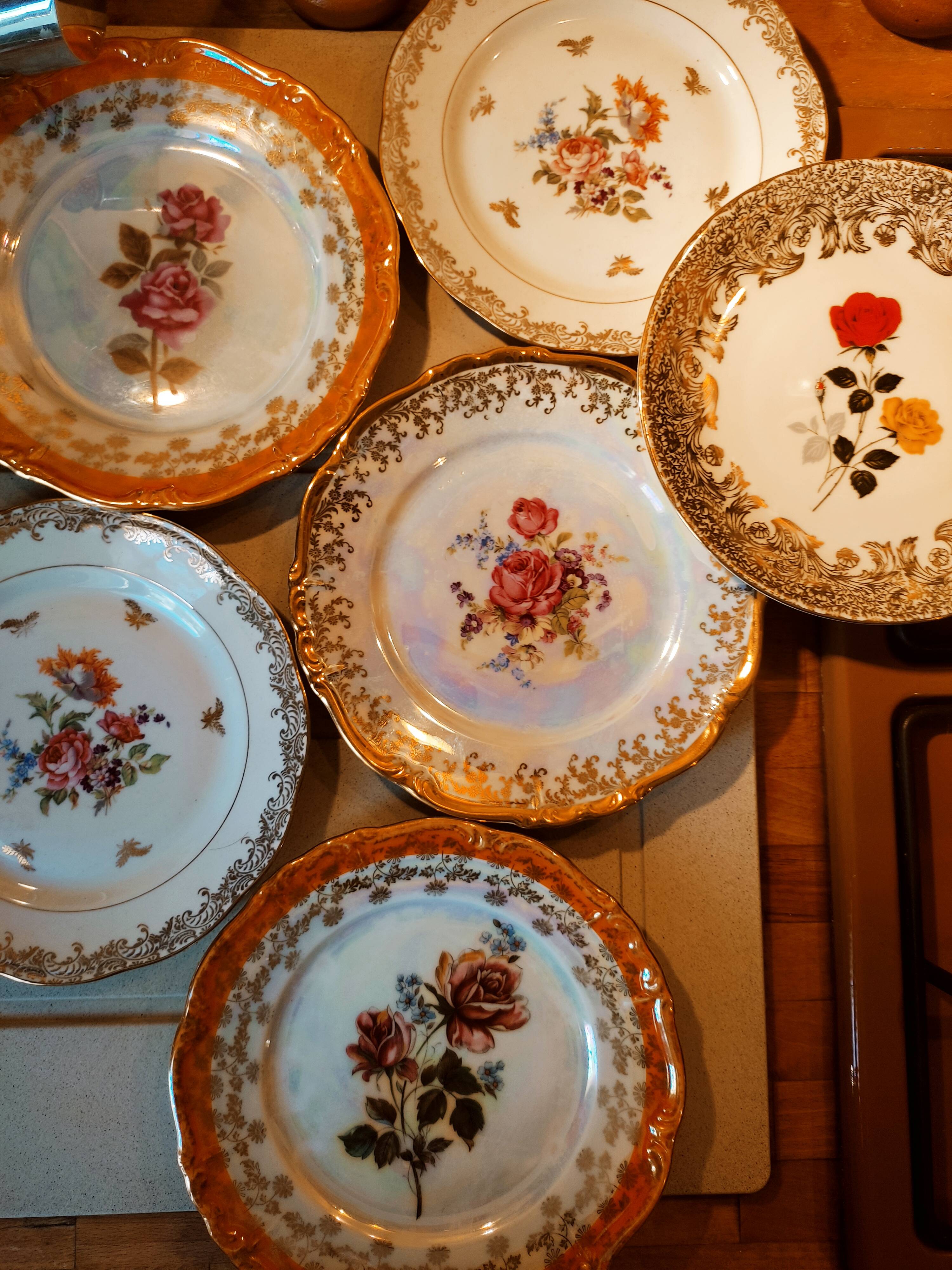 6 mismatched dessert plates decorated with roses