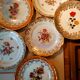 6 mismatched dessert plates decorated with roses