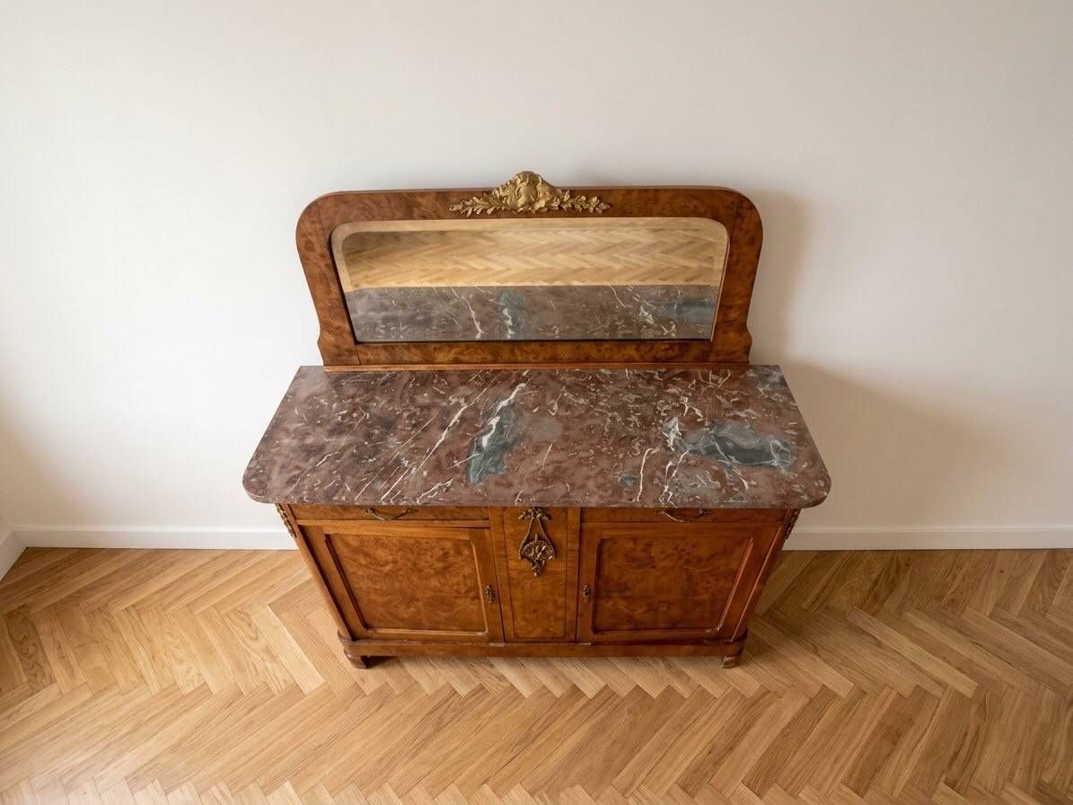 Antique sideboard in burl wood with marble and mirror.