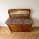 Antique sideboard in burl wood with marble and mirror.