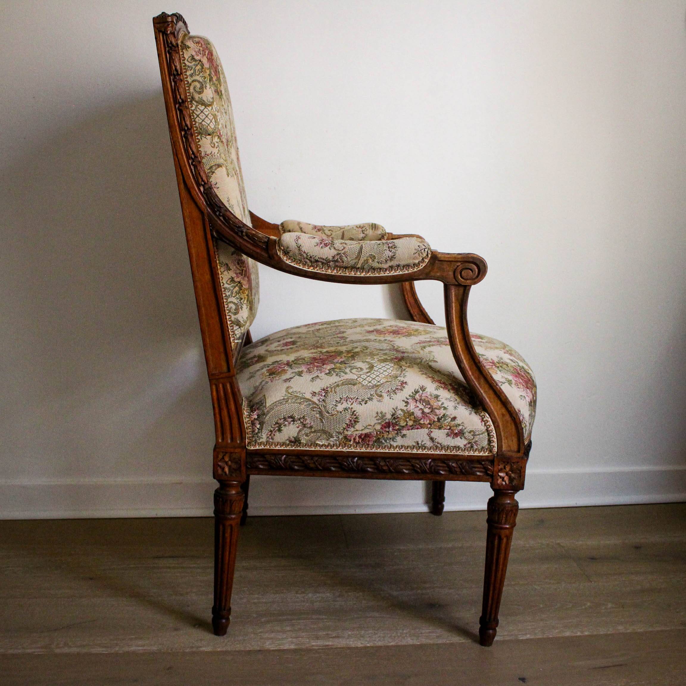 Louis XVI style carved armchair