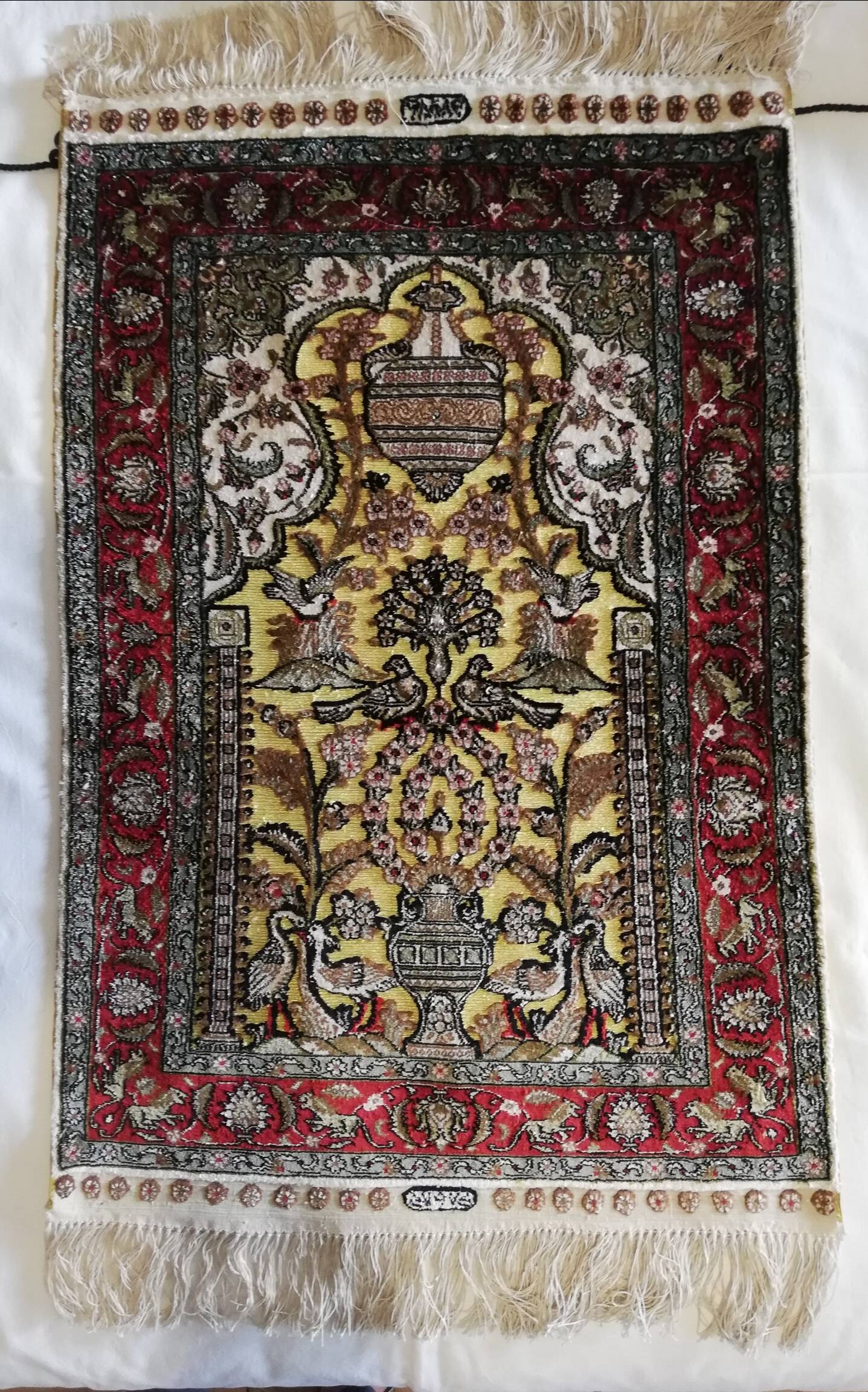 Hereke silk and gold thread carpet