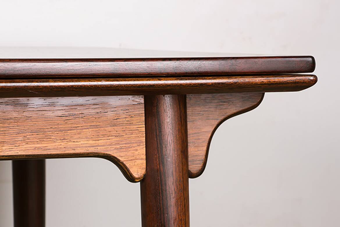 Danish extendable dining table in rosewood, model 54 by Gunni Omann