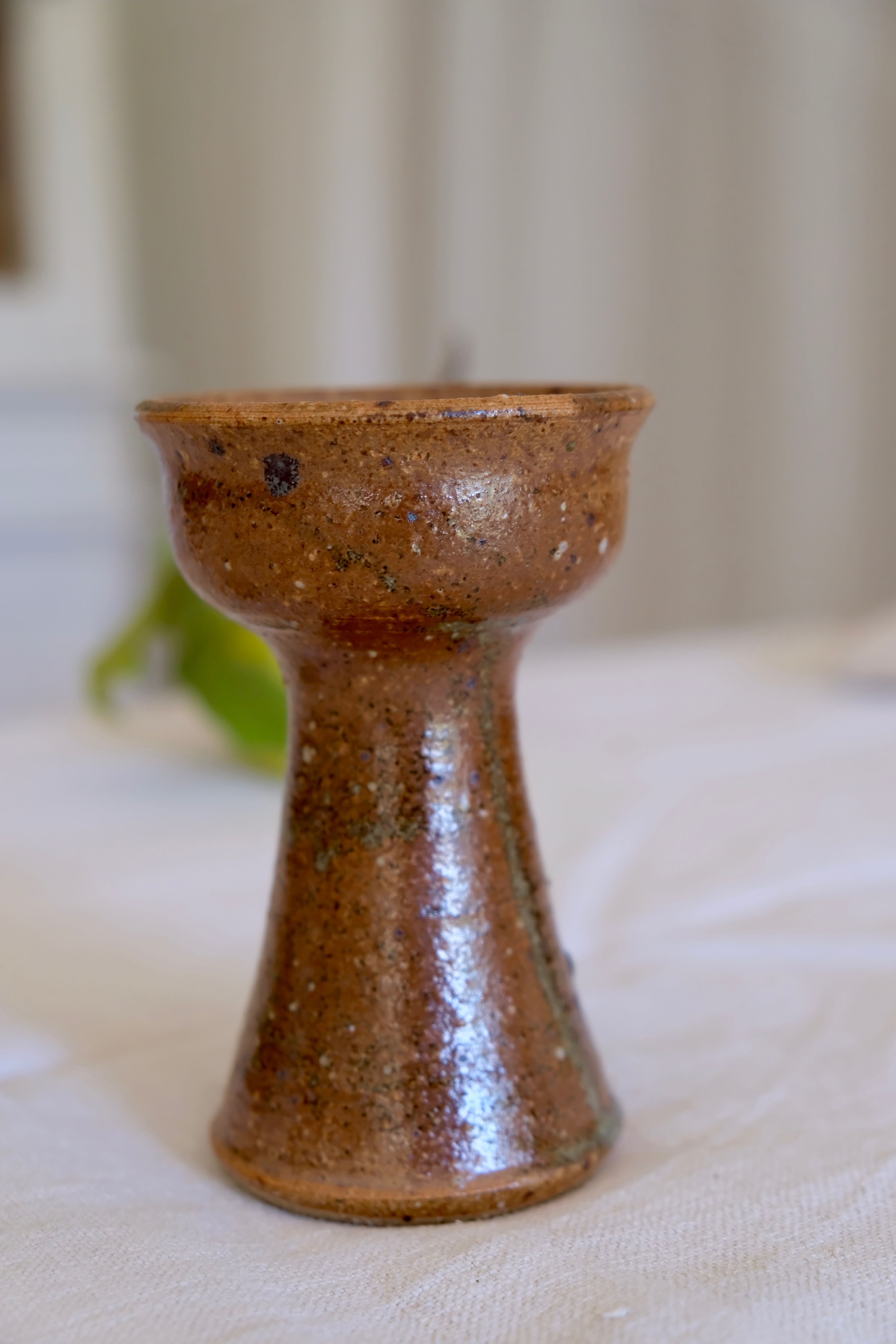 Old sandstone candle holder