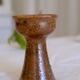 Old sandstone candle holder