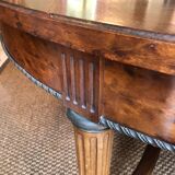 Important central pedestal table in mahogany, brass and bronze that can form a large dining table.