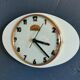 Horloge formica vintage pendule murale silencieuse ovale "Cadelec bleu"