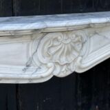 Louis XV style fireplace in white Carrara marble arabescato