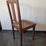Wooden and cane chair. Carved wooden chair with cane seat.