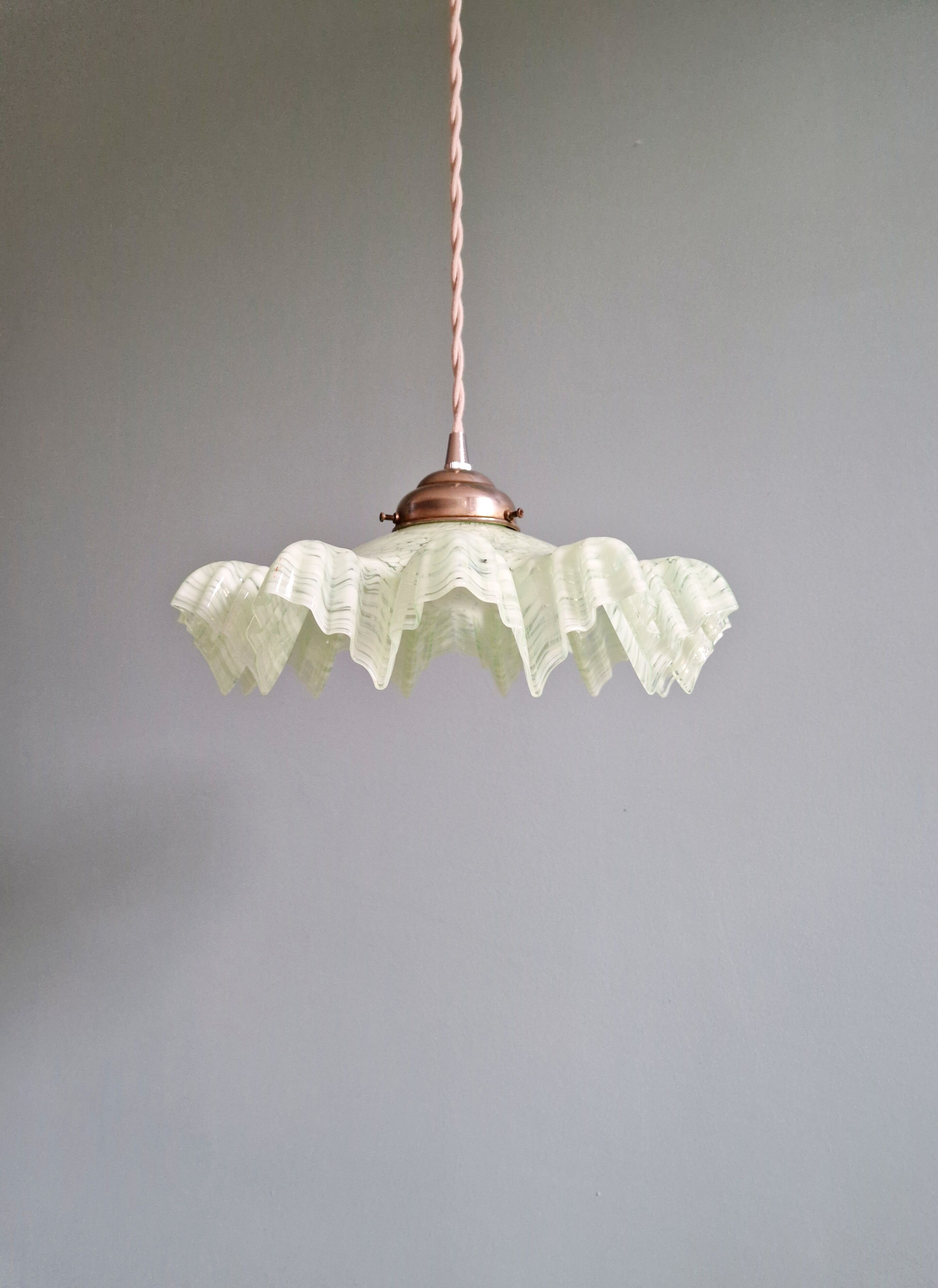 Art Deco pendant light in speckled green and white pleated glass, 1920s-30s.