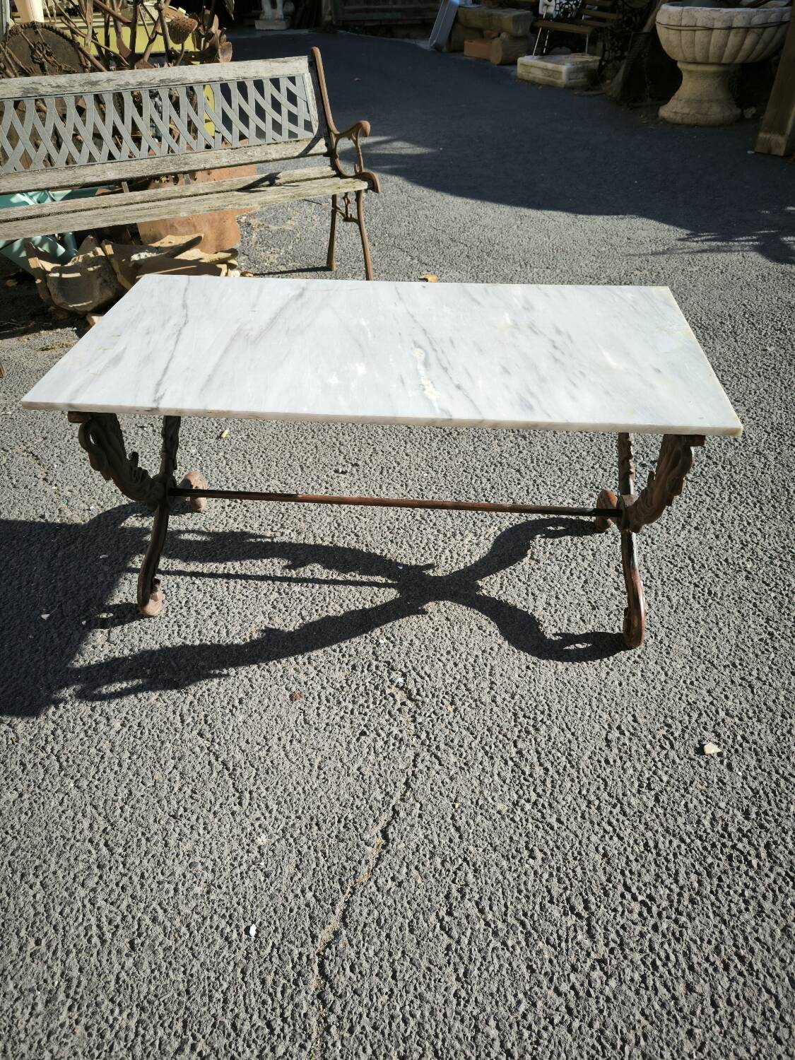 Cast iron and marble swan-neck coffee table