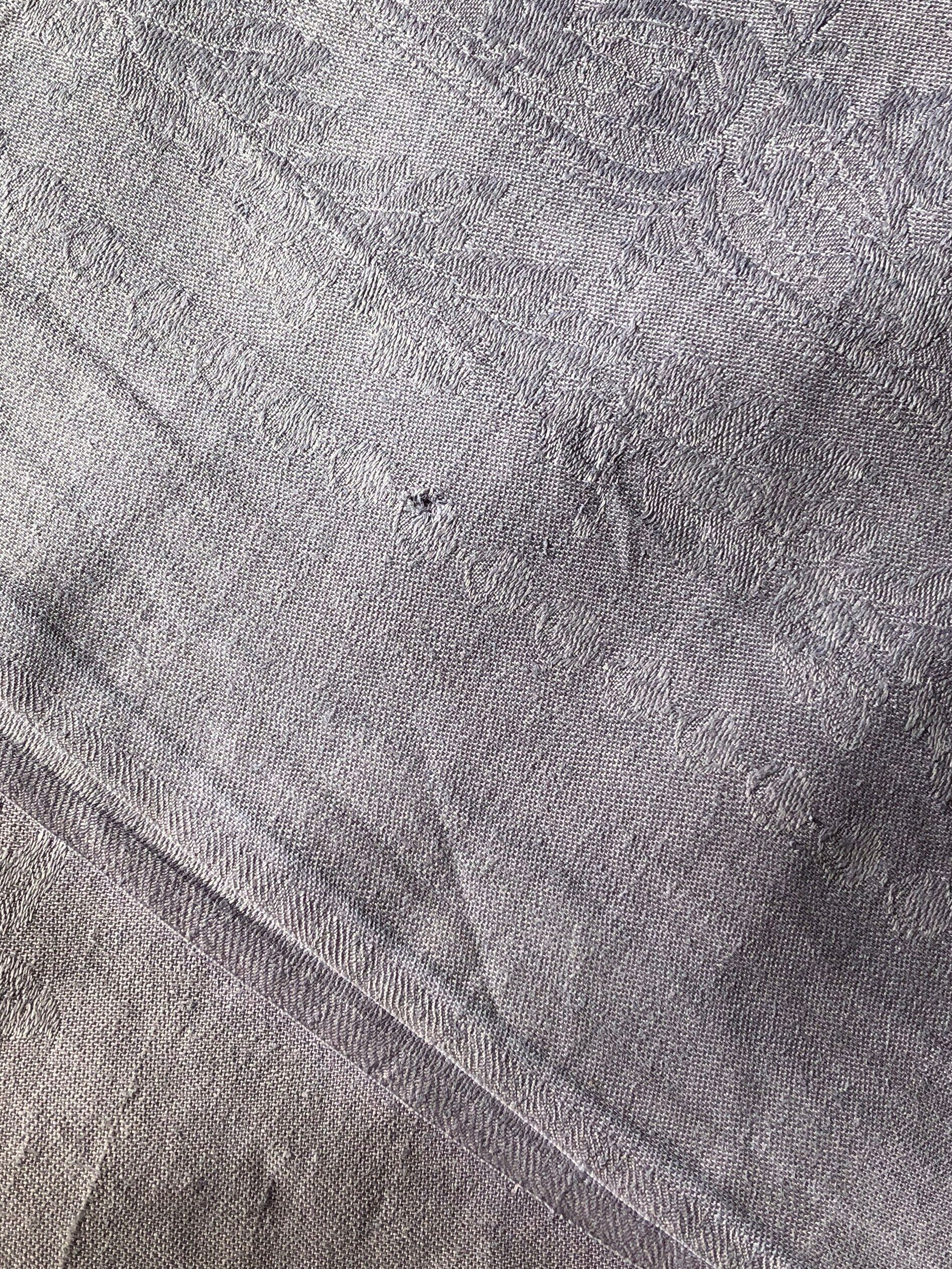 Old linen tablecloth and lilac-tinted silk