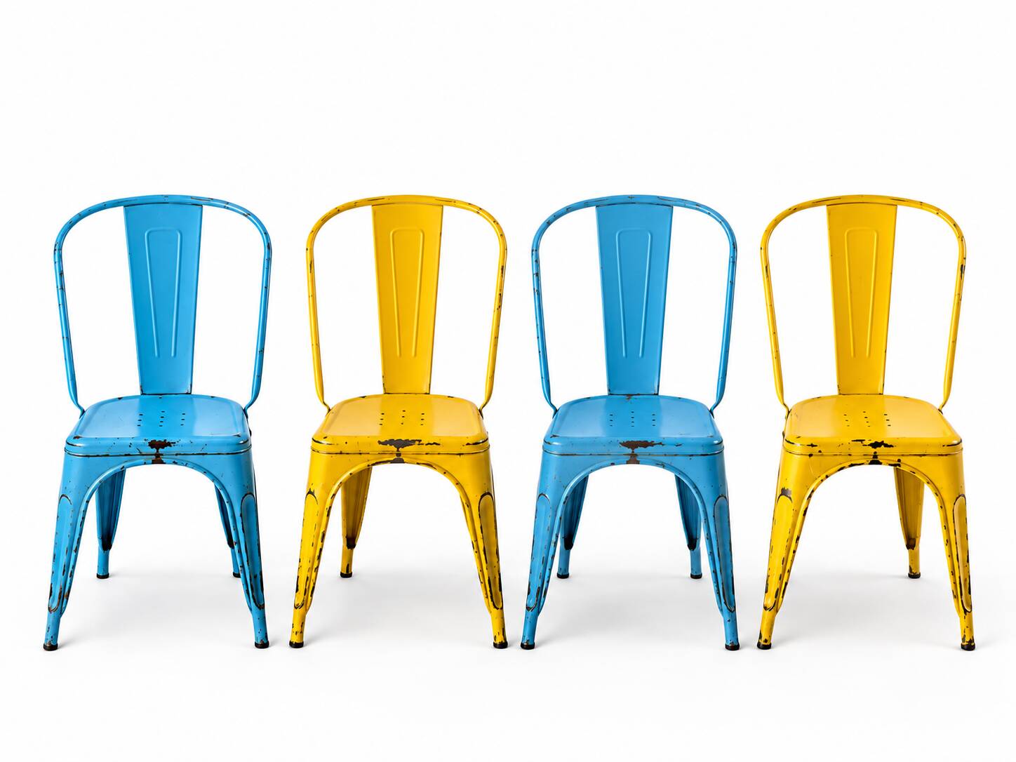 Set of 4 Tolix chairs, 2 yellow, 2 blue. 1960s edition.