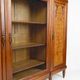 Art Deco showcase bookcase in carved walnut, France, circa 1925