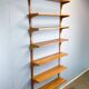 Danish wall shelf by Hansen and Guldborg, teak, aluminum rails, 1960s.