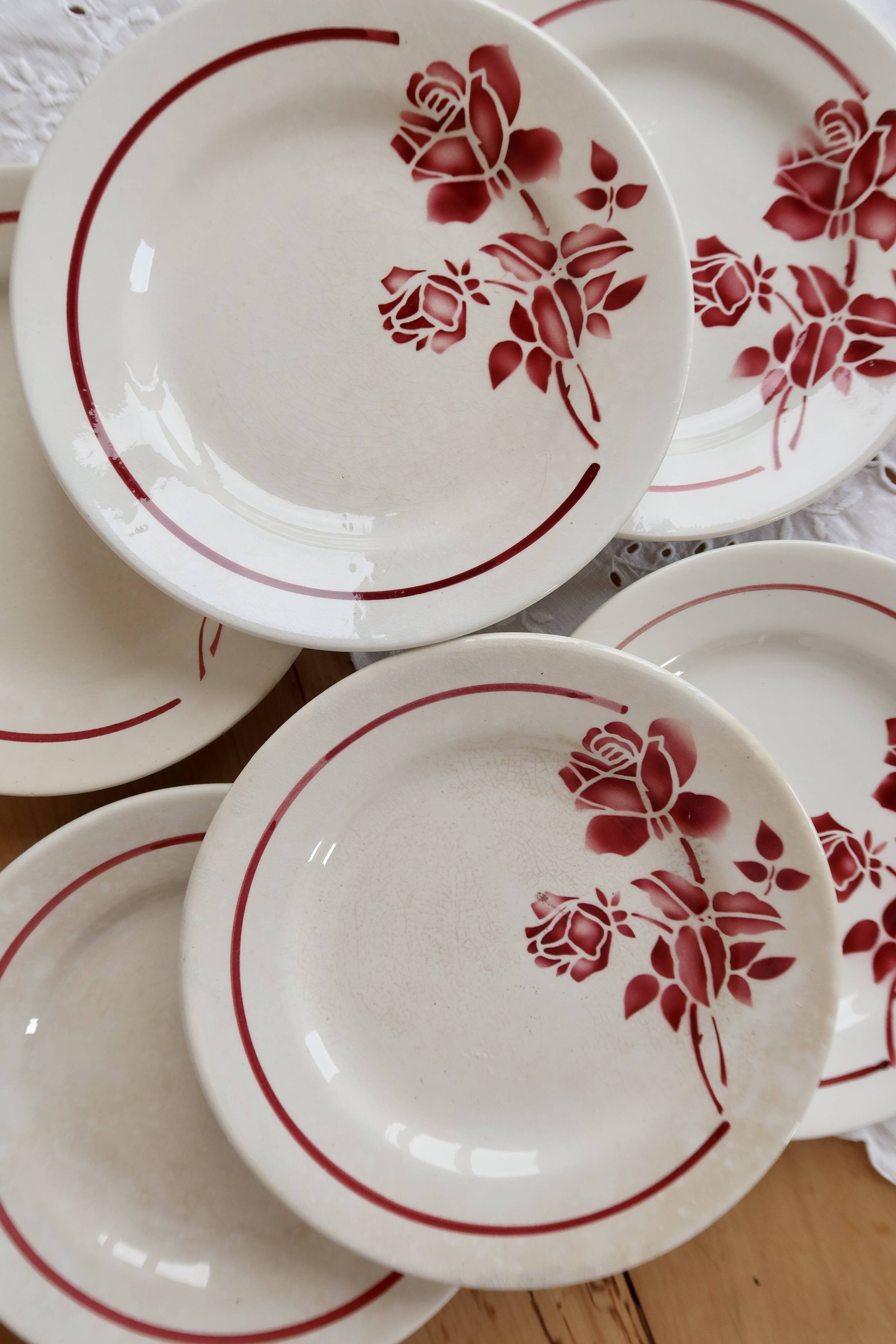 6 vintage dessert plates Moulin des Loups with burgundy floral decoration.