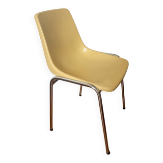 Vintage tubular chair in pastel yellow