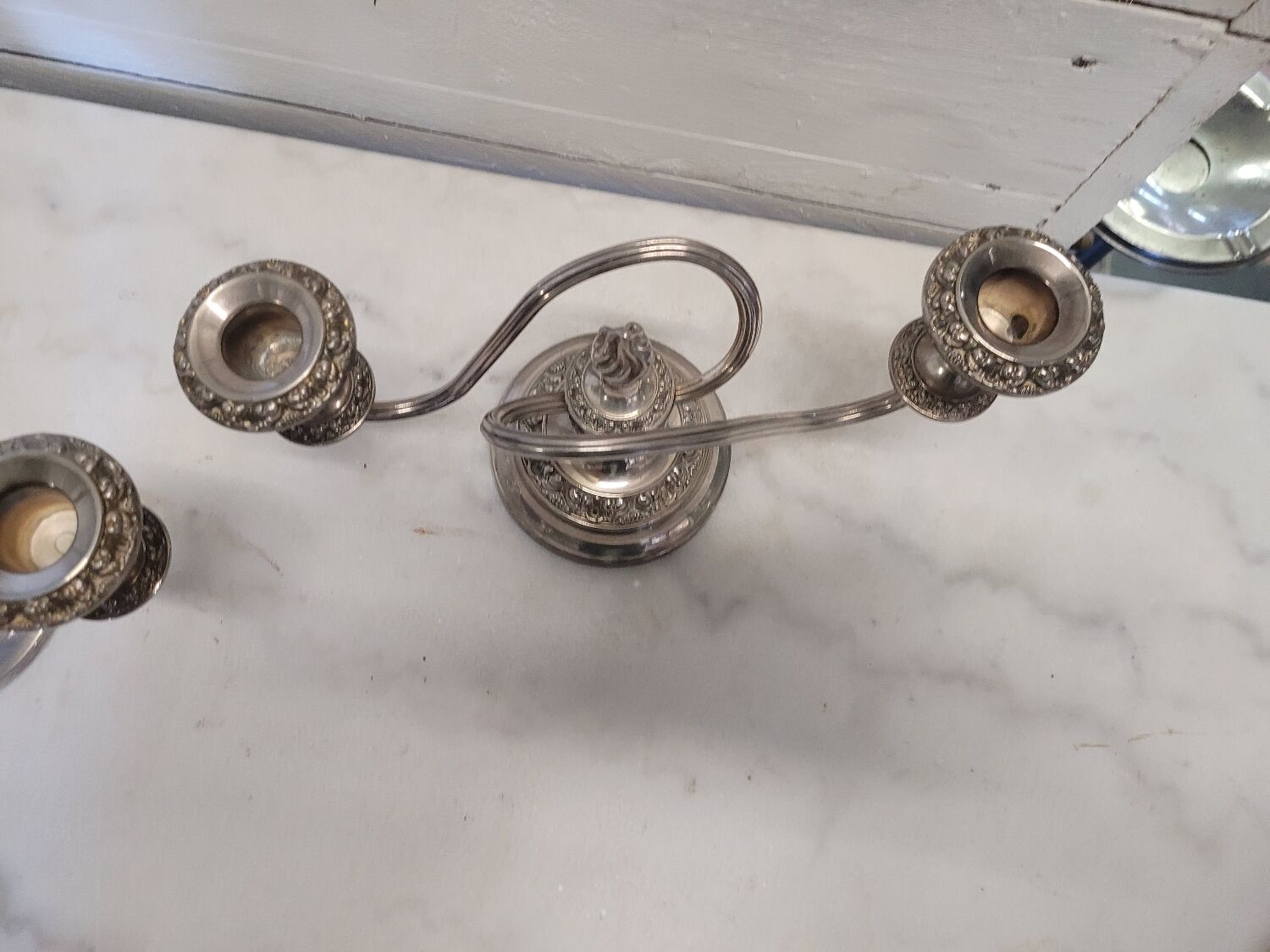 Pair of silver metal candlesticks