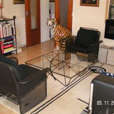 Pair of Italian armchairs in black lacquered metal with cushions from the house Talin
