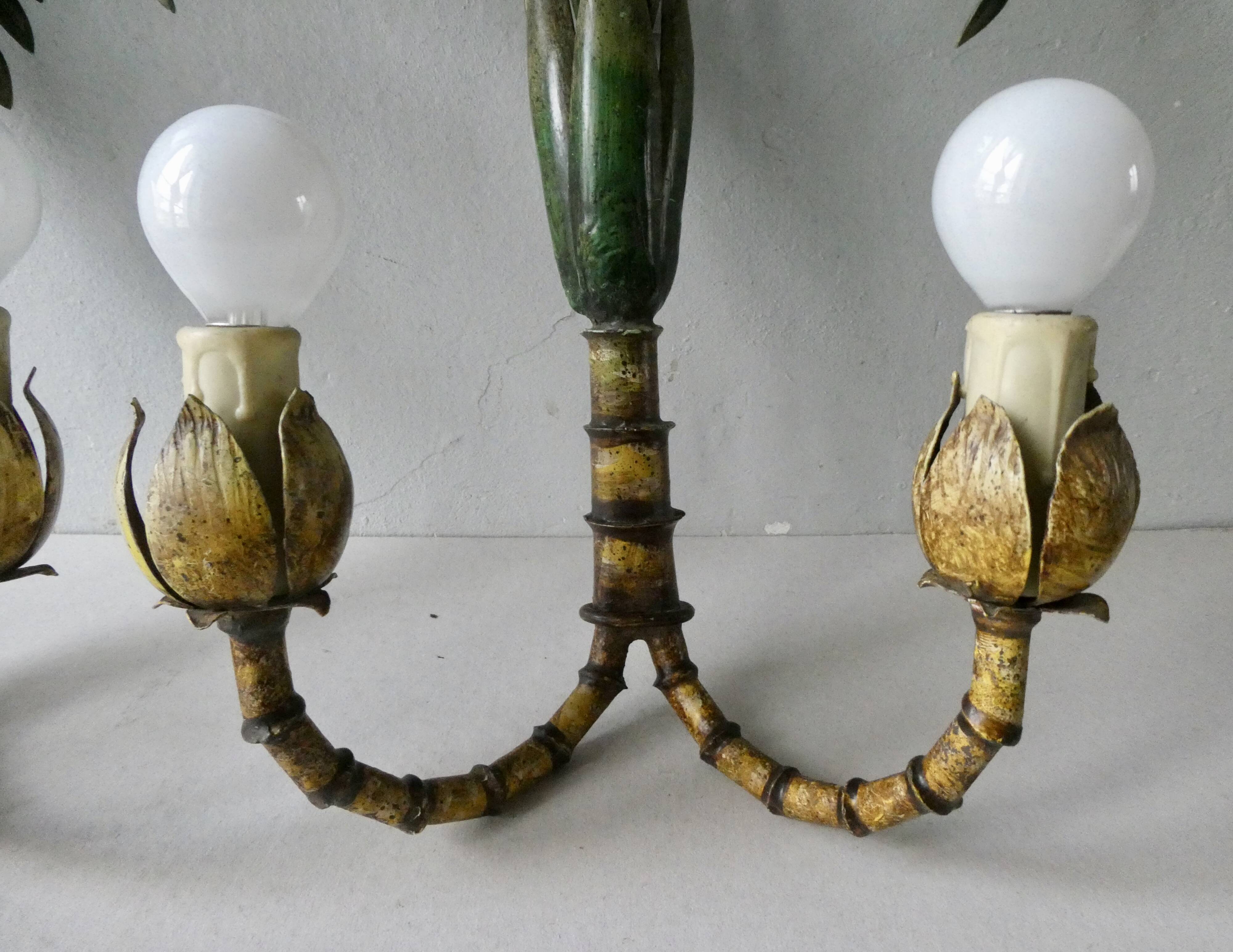 Pair of bamboo and palm sconces in metal