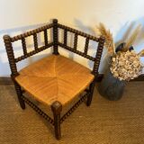 Corner chair in turned wood and straw