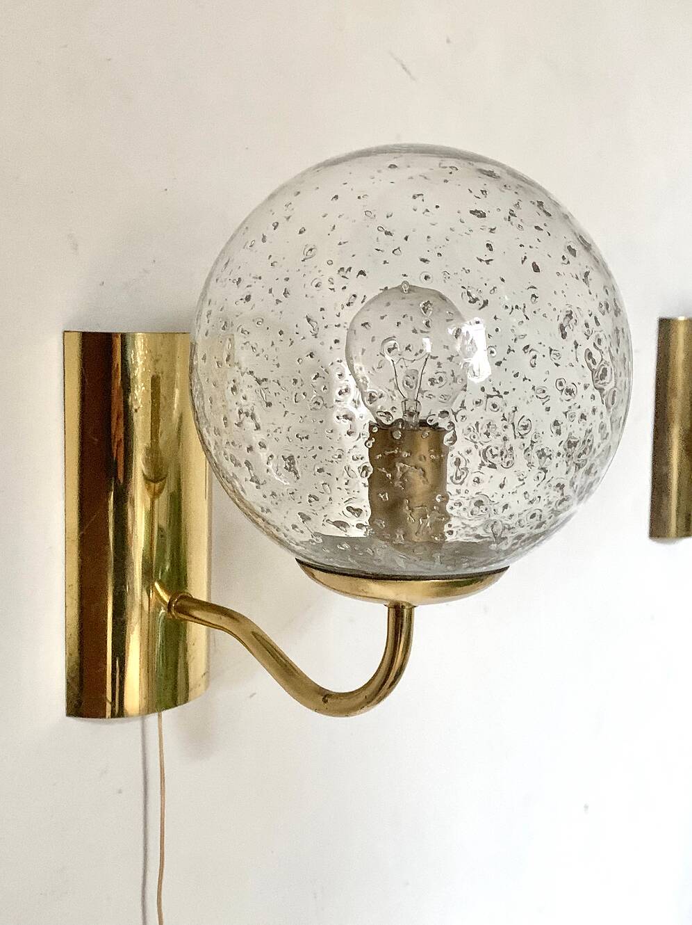 Pair of brass and glass wall sconces