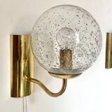 Pair of brass and glass wall sconces