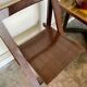 Chaise pliante en bois foncé