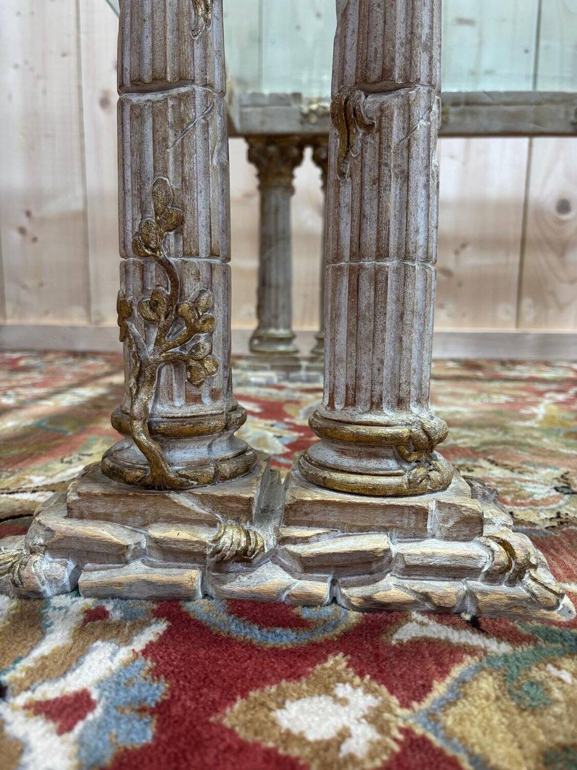 Coffee table with Corinthian columns and glass top