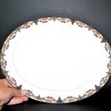 Oval dish in Limoges porcelain W.GUERIN &Cie decorated with floral garlands