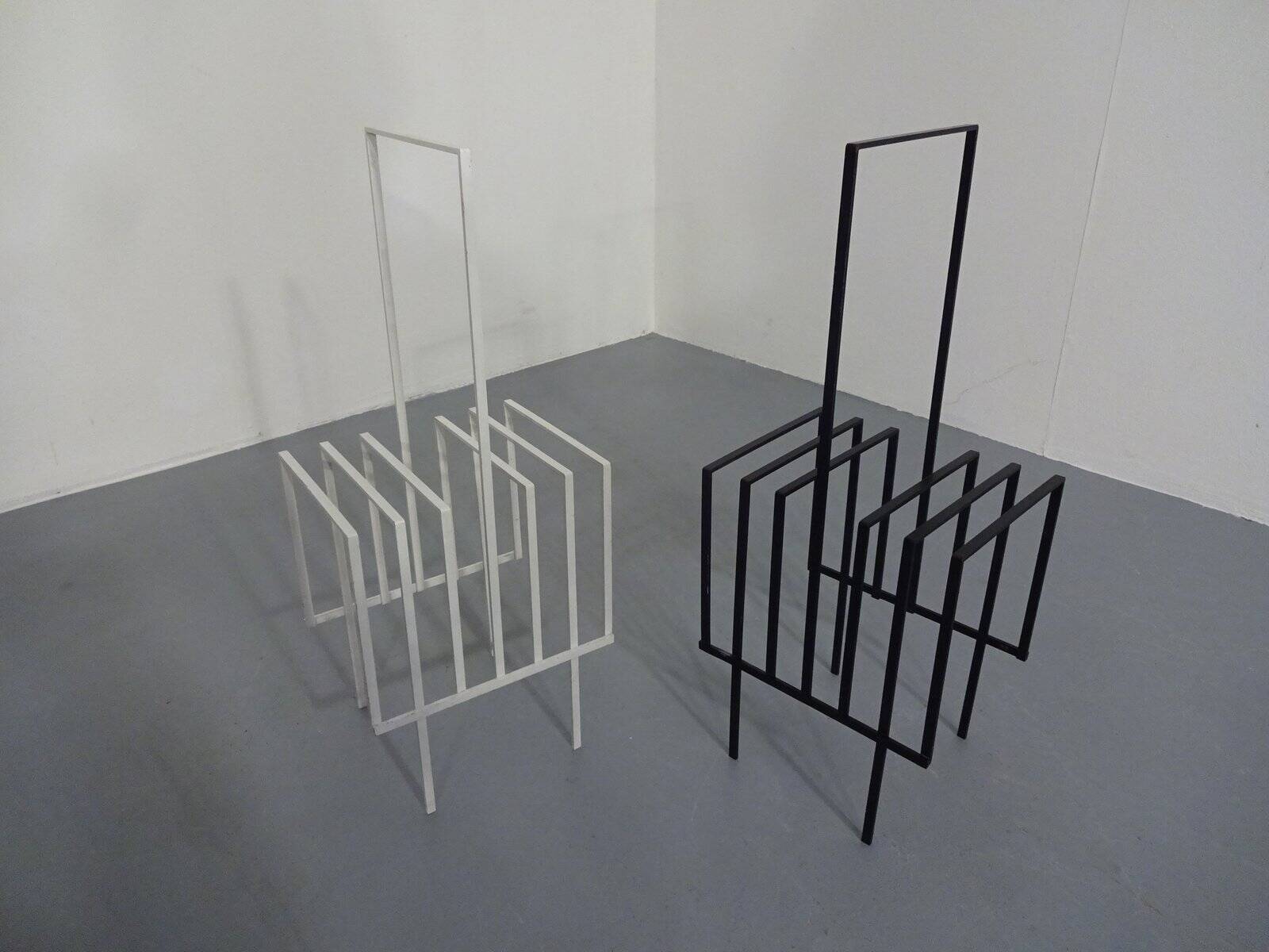 Steel magazine or record racks, 1960s, set of 2