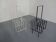 Steel magazine or record racks, 1960s, set of 2