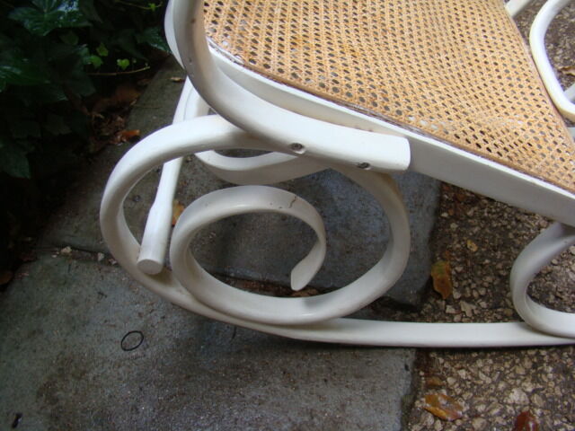 Antique caned rocking chair