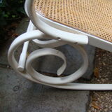 Antique caned rocking chair