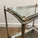 Neoclassical style rolling table in silver metal