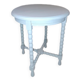 Table basse ronde en bois massif  à 4 pieds datant des années 1950 repeinte