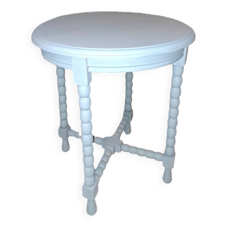 Table basse ronde en bois massif  à 4 pieds datant des années 1950 repeinte