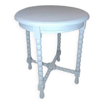 Table basse ronde en bois massif  à 4 pieds datant des années 1950 repeinte