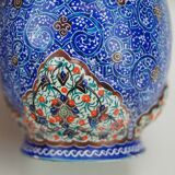 Piriform vase with a flared metal collar enamelled with a polychrome decoration, marked "Amini Iran" on the reverse.