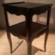 Black bedside table with two shelves, Louis XV style