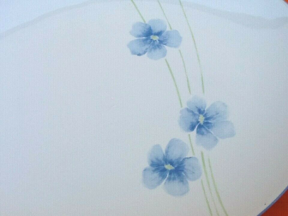 Serving dish by Eléonore Baillet Oval shape Porcelain with floral decoration