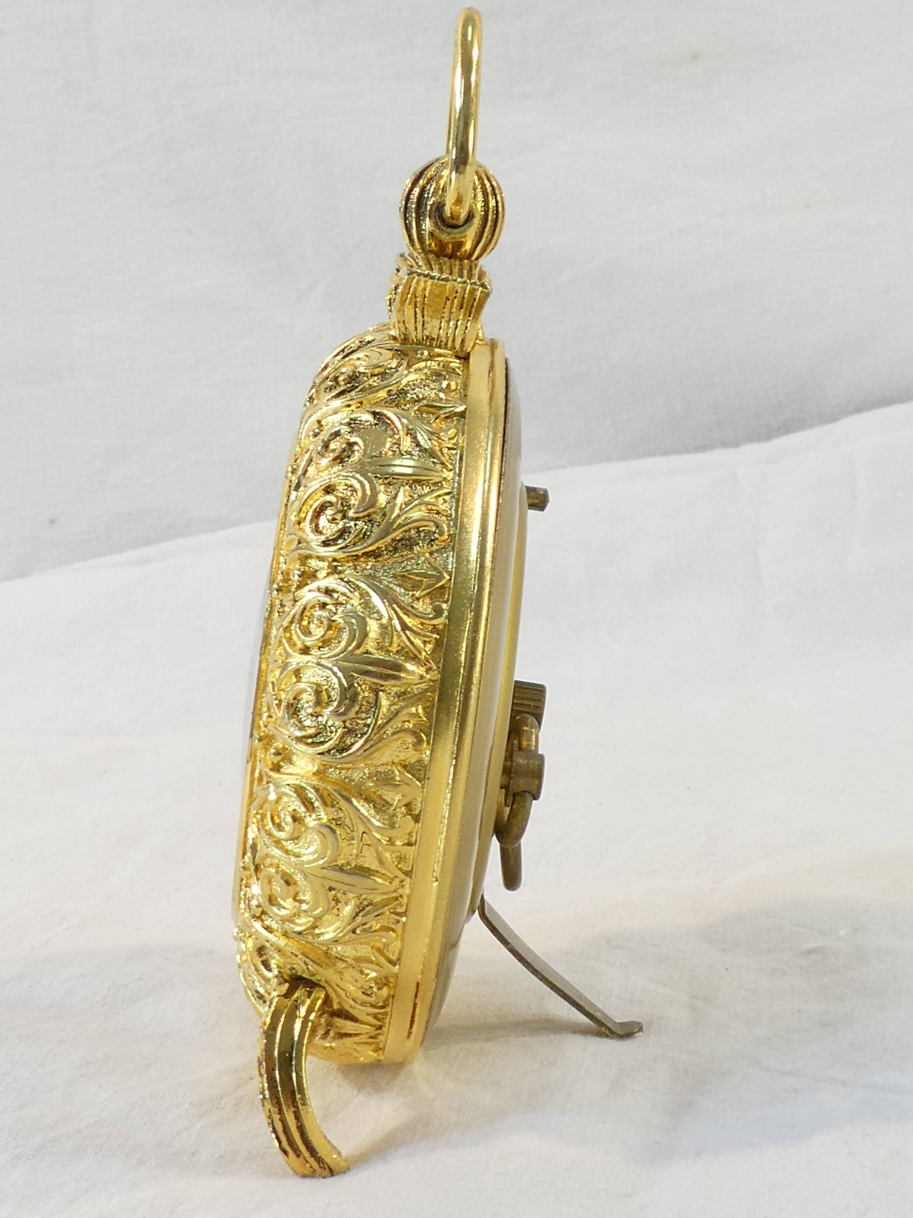 LANCEL alarm clock in chiseled bronze and gilded metal