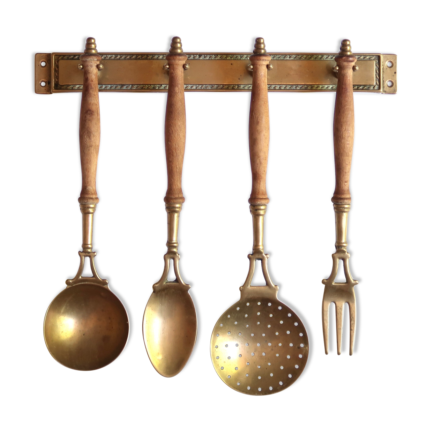 Brass and wood kitchen utensils with wall display, 60s