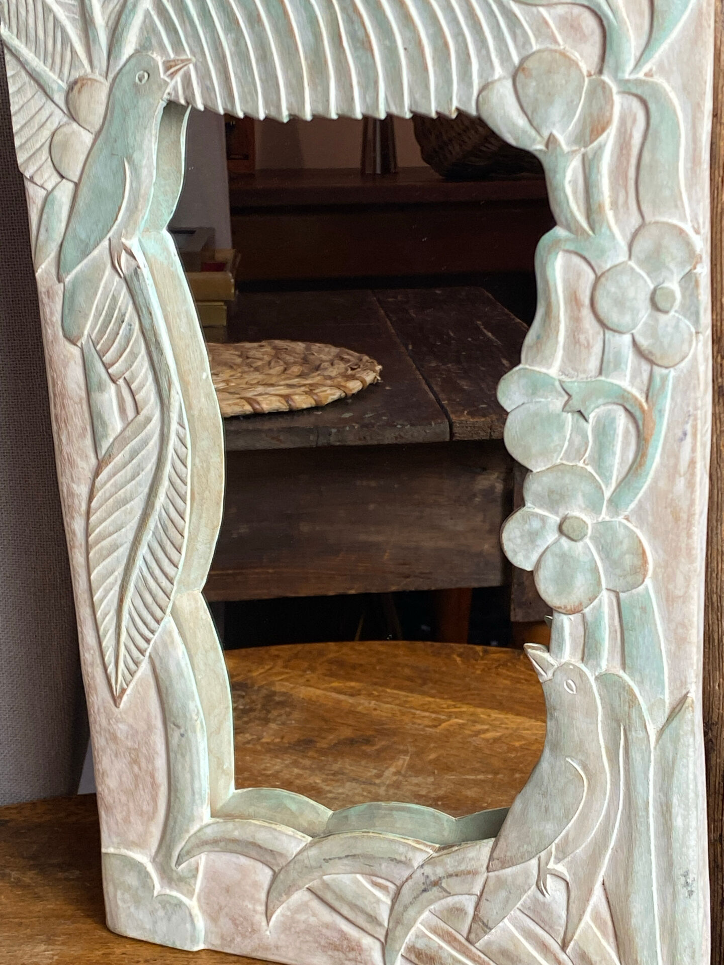 Carved wooden mirror