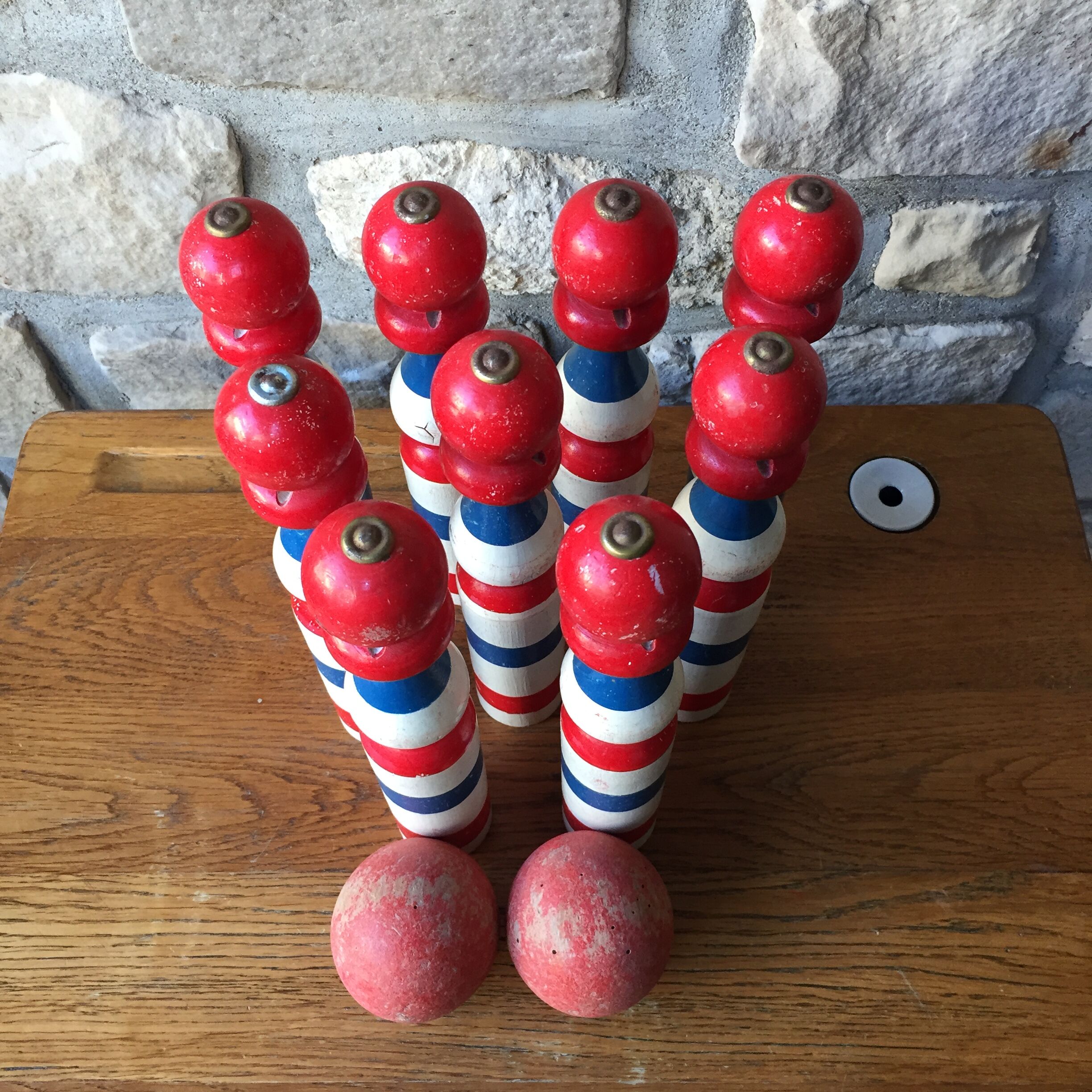 Old vintage wooden bowling game triclore plus two balls