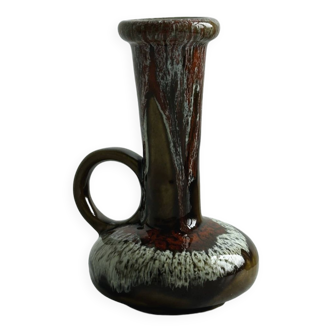 Glazed ceramic vase with multicolored patterns.