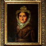Tableau à l'huile ancien encadré d'or représentant le portrait d'une dame au chapeau