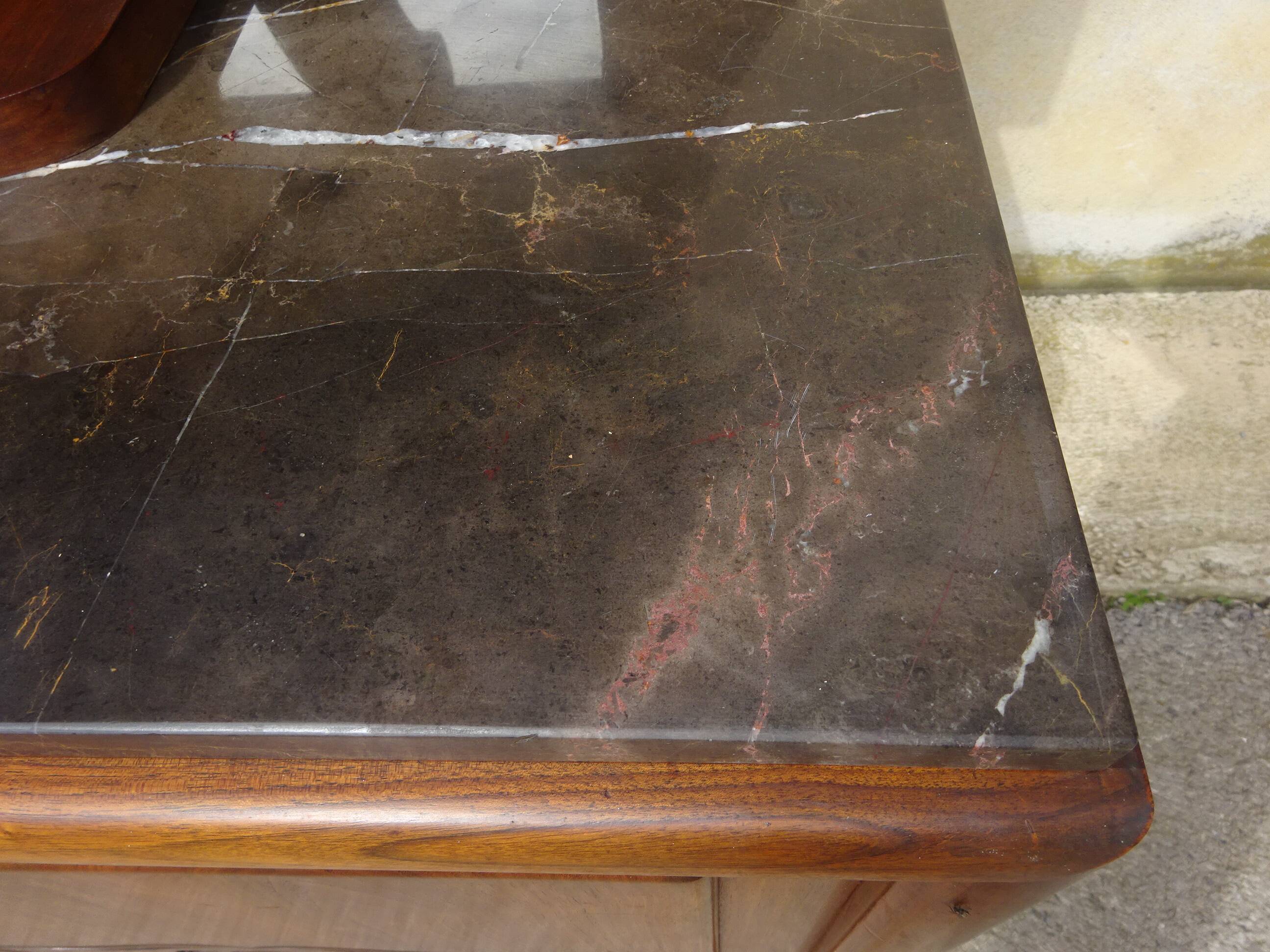 Solid walnut sideboard, moustache legs, black marble top.